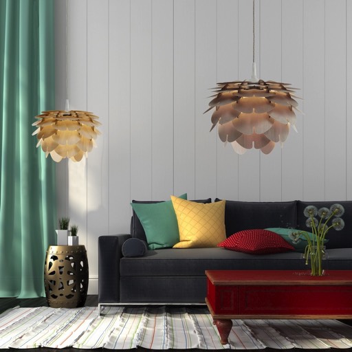 Two wooden lamps in cosy room with black sofa and a table.