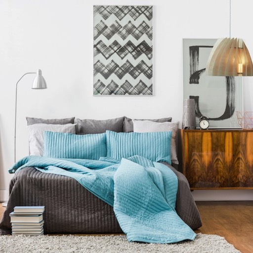 Etna ceiling lamp in modern bedroom. Sleek small wooden ceiling lamp